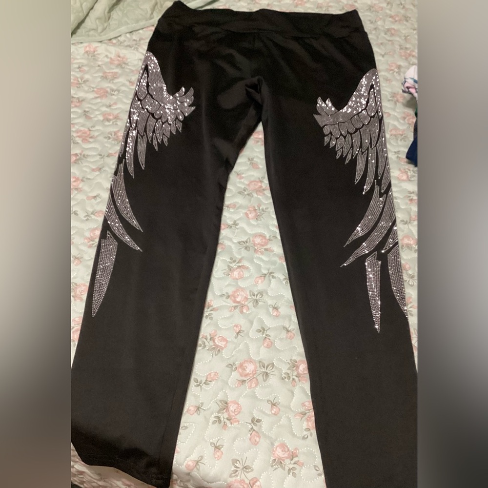 SHEIN Black Leggings with Silver rhinestone wing pattern.